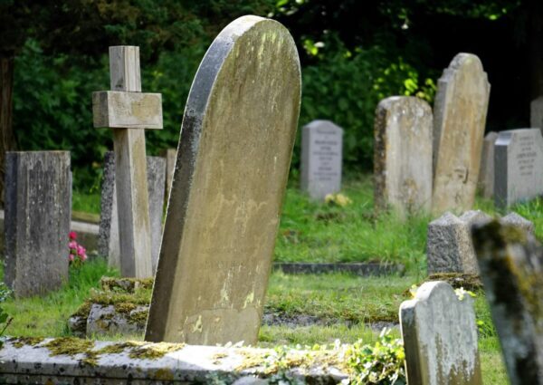 Close up of concrete headstones
